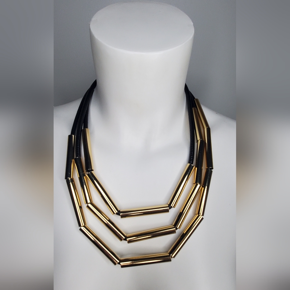 N Milano Necklace -Black Cord And Gold Metal with Embossed Design - From MILANO